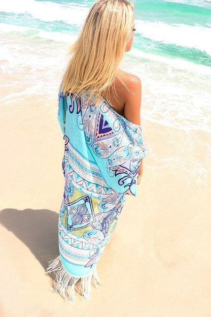 Caftan tenue de plage bleu lagon sexy à franges larobedeplage;fr