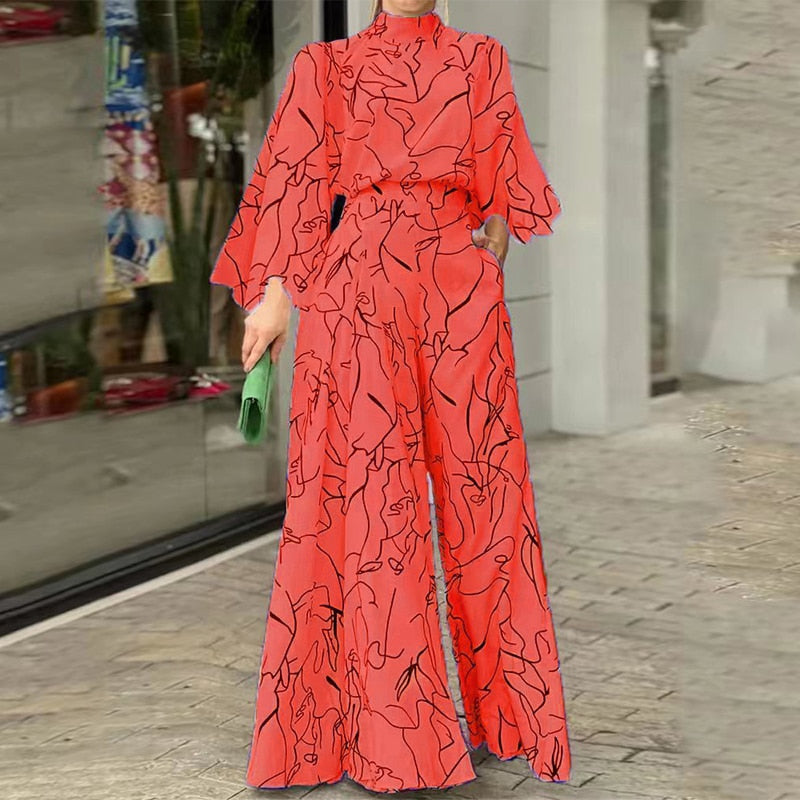 Combinaison élégante à motif artistique et manches longues rouge