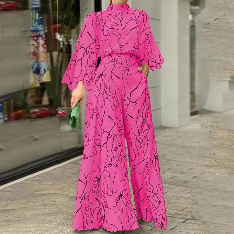 Combinaison élégante à motif artistique et manches longues rose